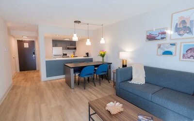 Day use suite with in-room kitchen and living area at Les Suites Hotel Ottawa.