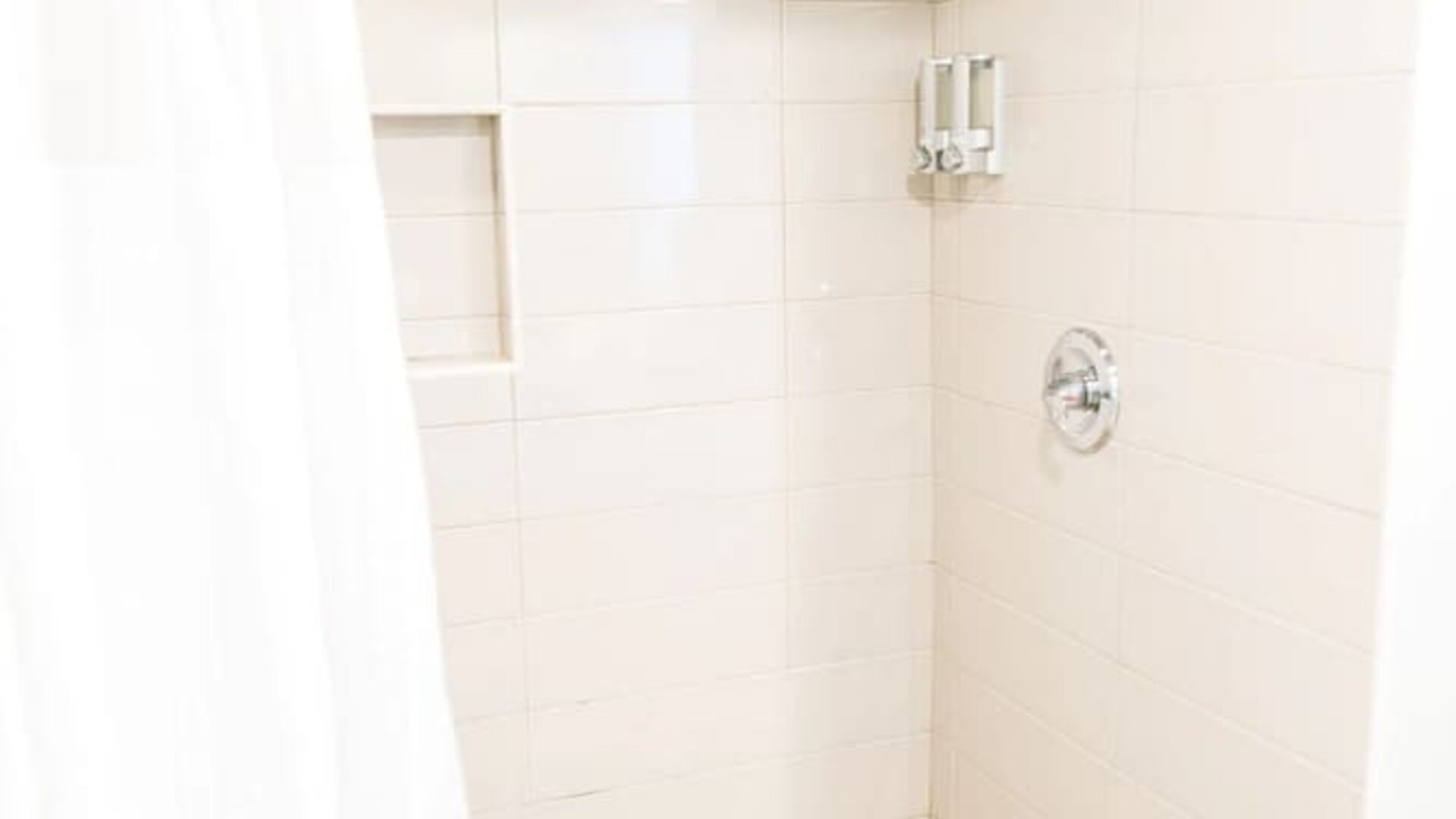 Guest bathroom with shower at Hotel Current.