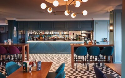 Hotel bar with lounge sitting at Thistle London Heathrow Terminal 5.