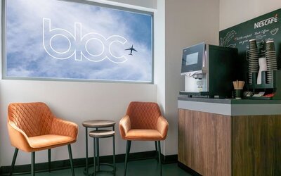 Coffee maker with lounge seating at Bloc Hotel.