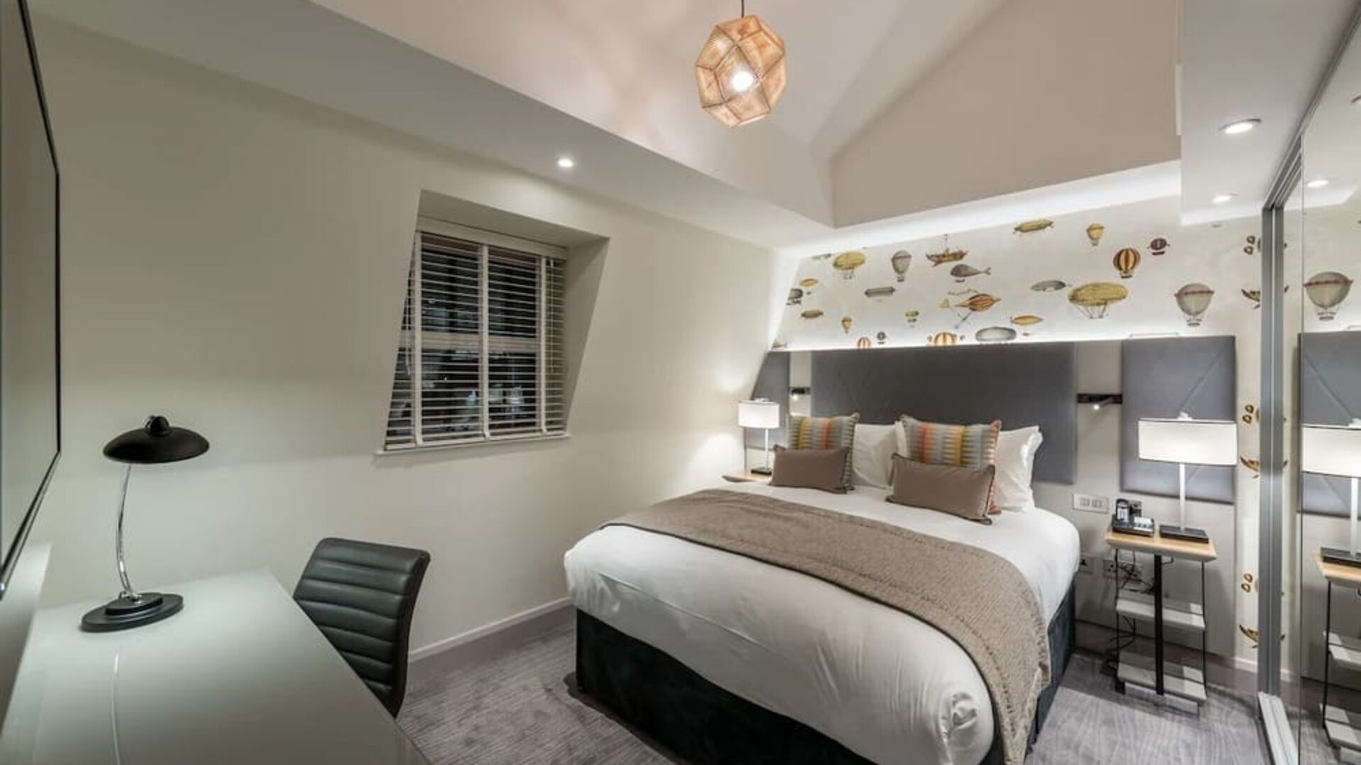 Day use room with TV screen and work desk at Mercure Hotel London Hyde Park.