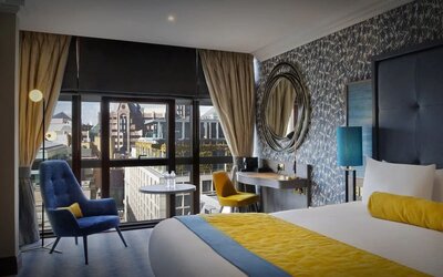 Day use room with work desk at Leonardo Royal Hotel London City.