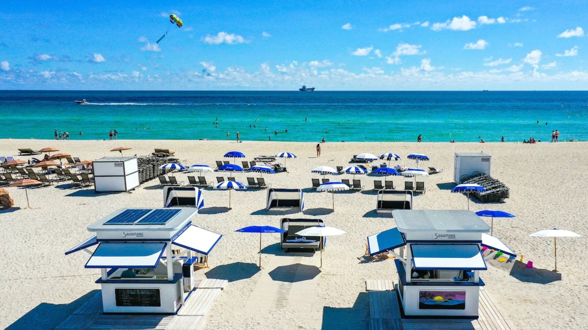 On the beach with ample sun loungers at The Sagamore Hotel South Beach.