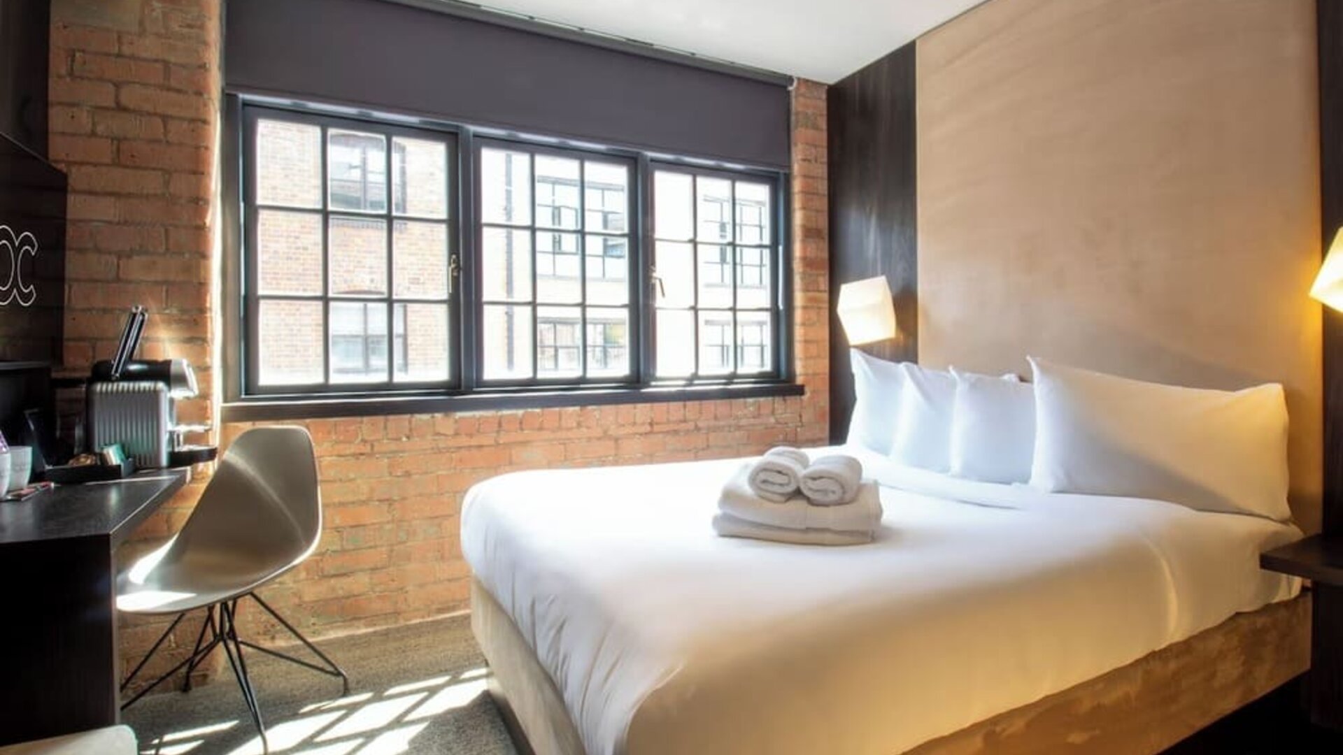 Day use room with large window, work desk and coffee maker at Bloc Hotel Birmingham.
