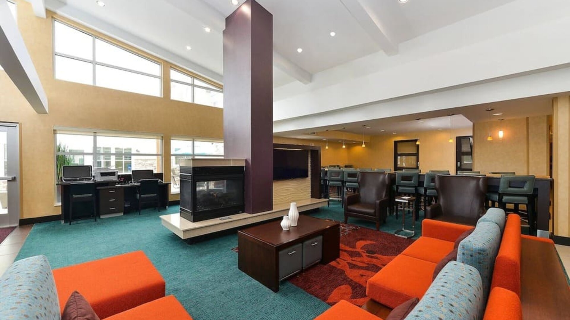 Lobby and coworking lounge at Residence Inn Champaign.