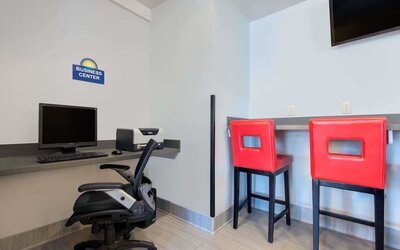 Business center with computer and printer at Hotel 1550 SFO.