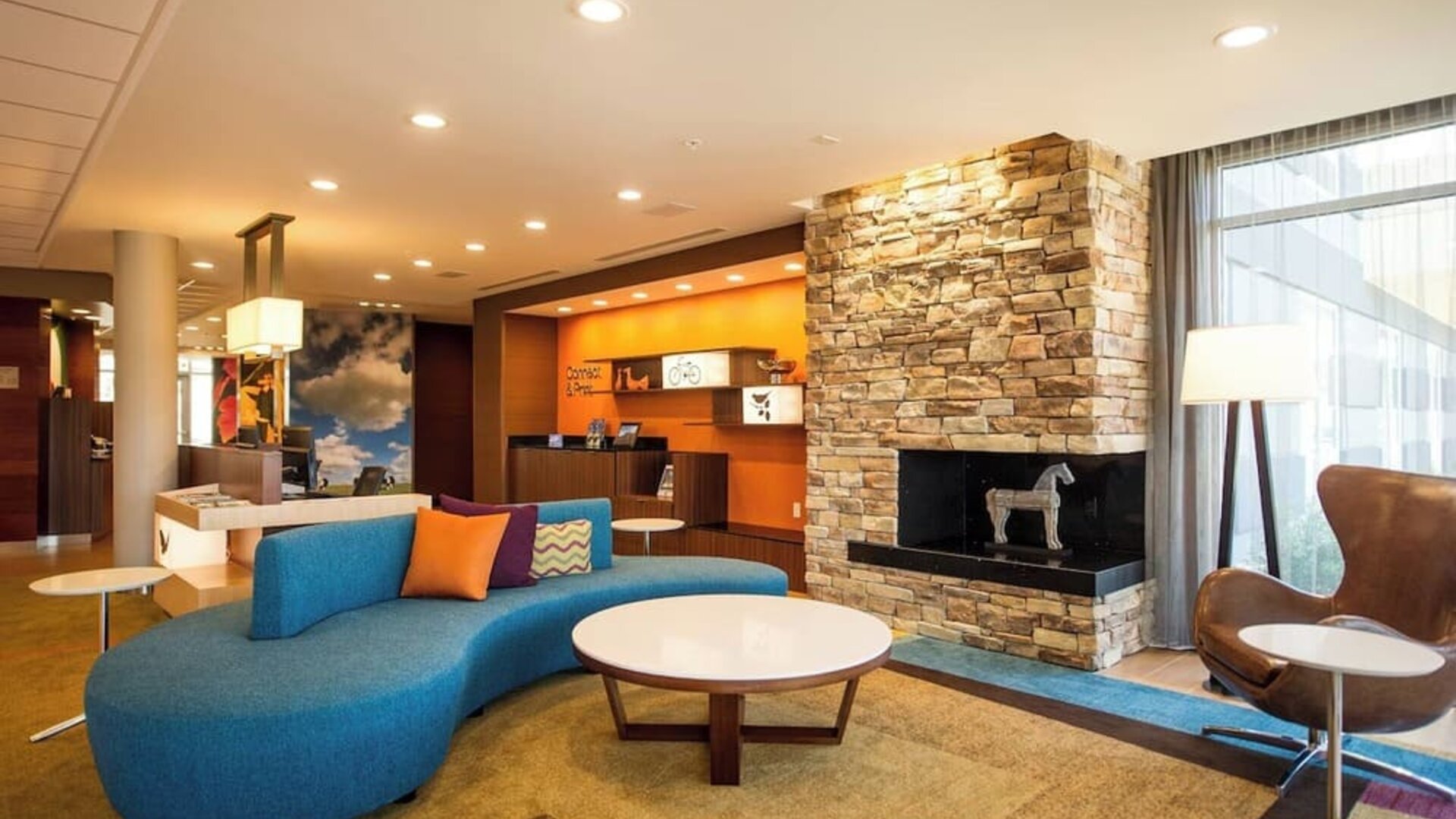 Lobby and coworking lounge at Fairfield Inn And Suites Cambridge Ohio.