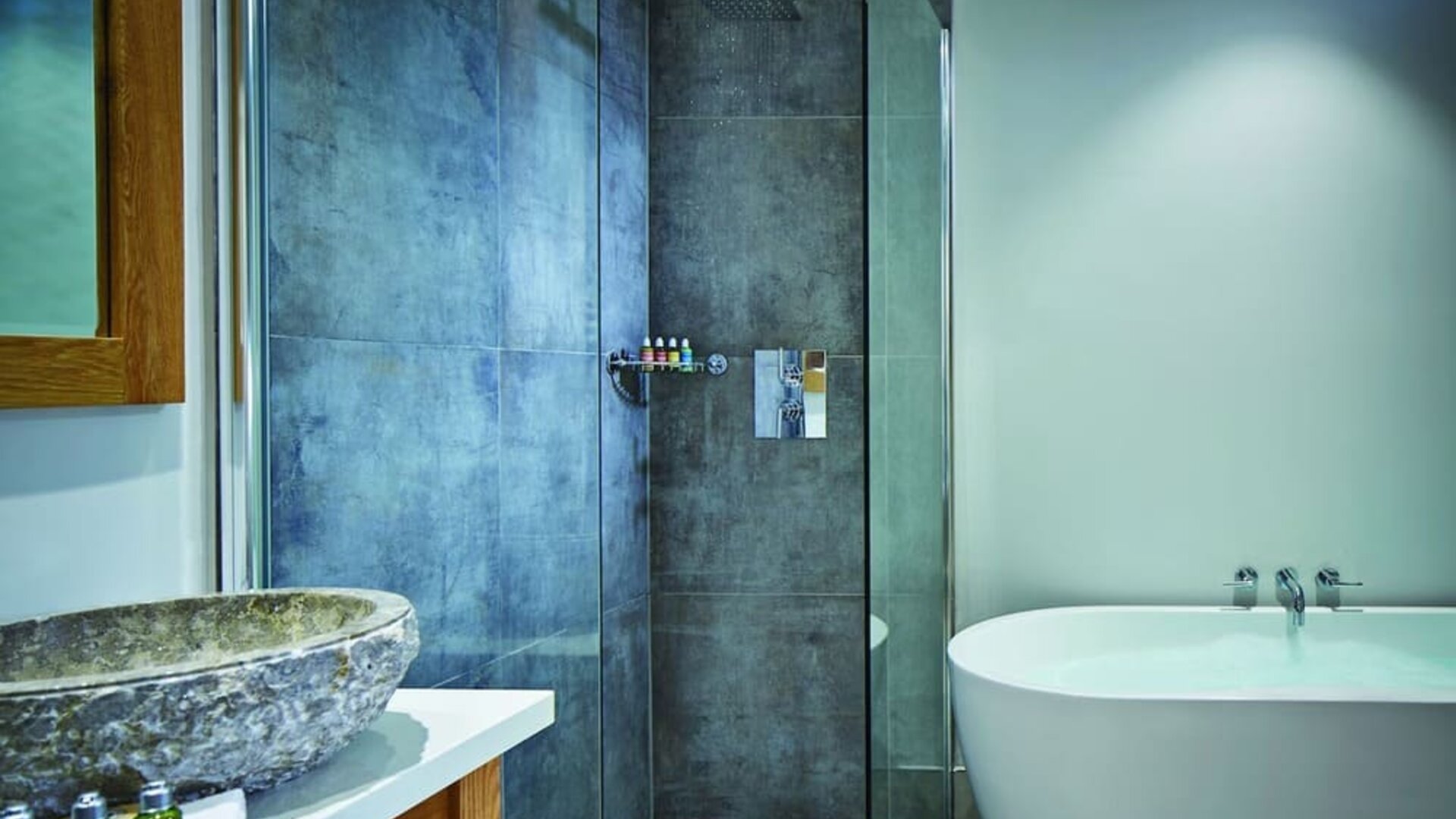 Private bathroom with tub and shower at Barnett Hill Hotel.