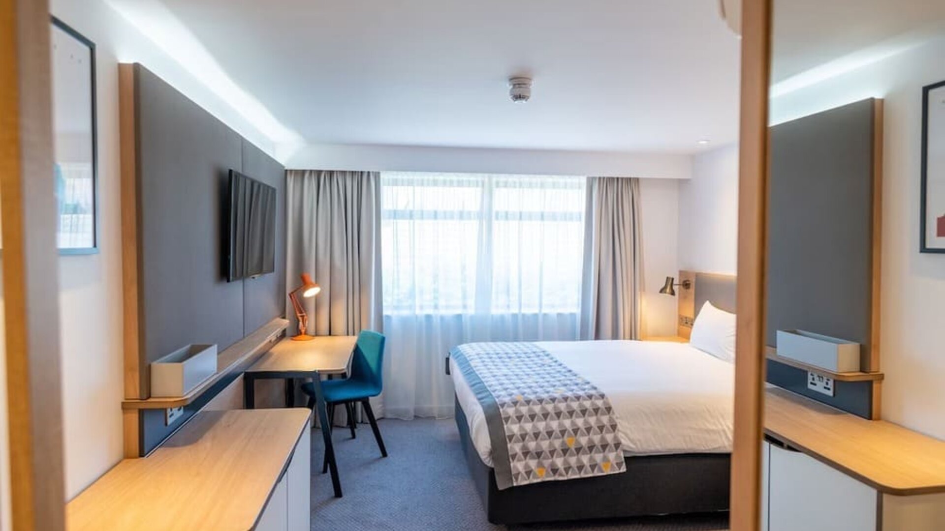 Bright and spacious day use room with work desk at Holiday Inn Leicester-Wigston.