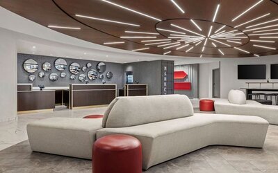 Lobby and coworking lounge at Renaissance Newark Airport Hotel.