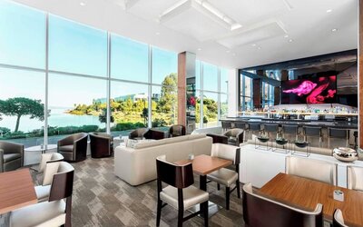 Lounge and coworking area at AC Hotel By Marriott SFO/Oyster Point Waterfront.