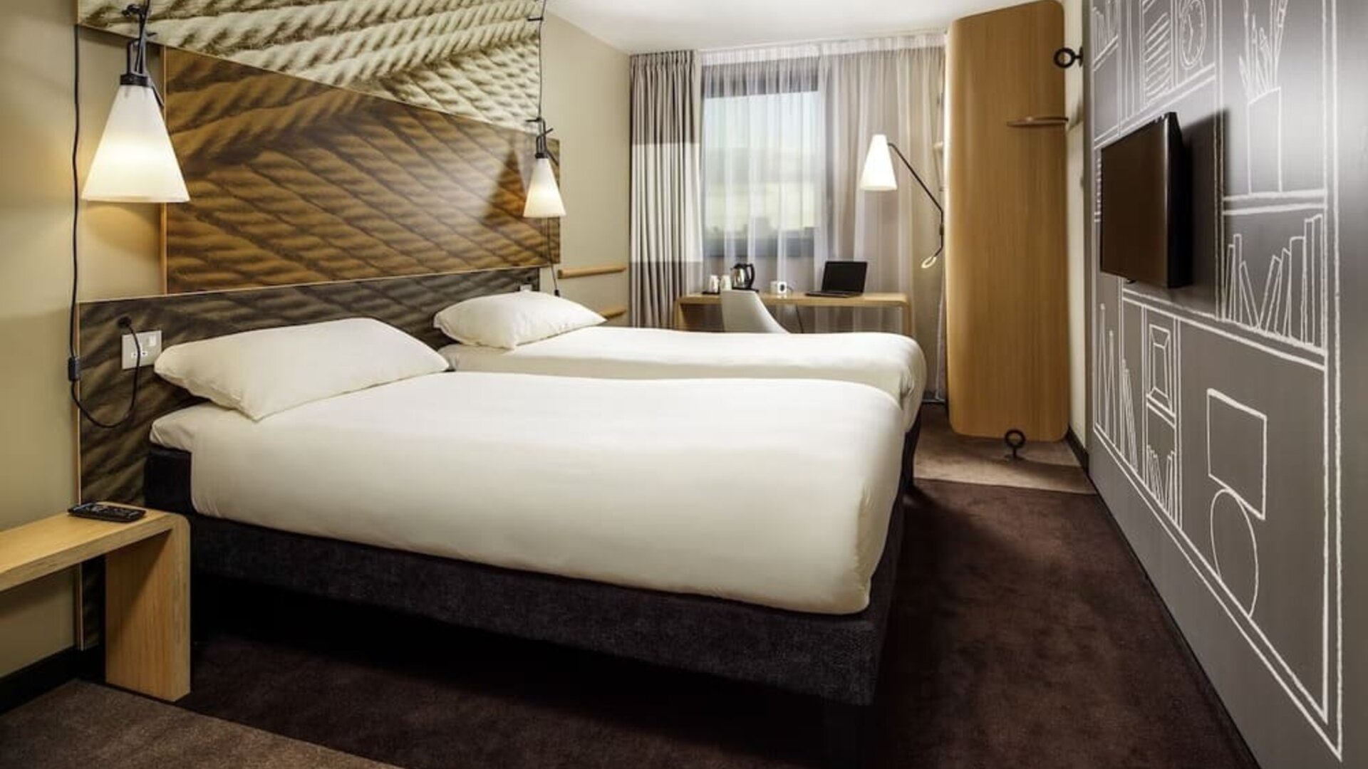 Day use room with work desk, TV screen and private bathroom at ibis Leicester City.