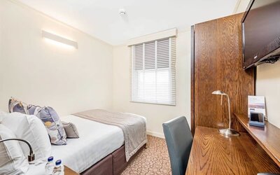 Standard day use with TV screen and work desk at Mercure London Paddington Hotel.