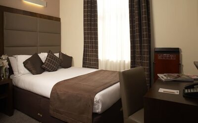 Day use room with work desk at Mercure London Paddington Hotel.