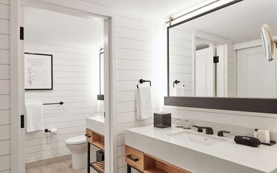 Guest bathroom with shower at The Inn At Saratoga, Tapestry Collection By Hilton.