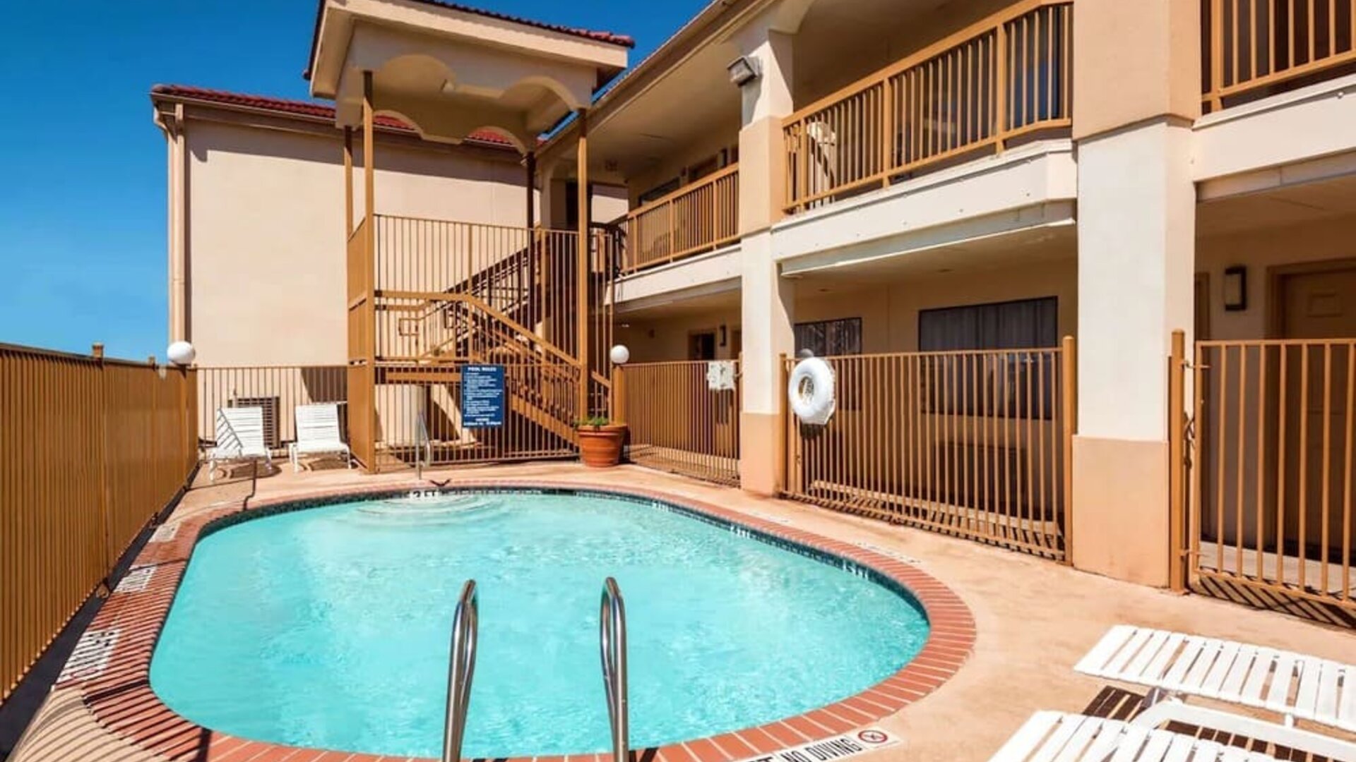Refreshing outdoor pool at Days Inn By Wyndham San Antonio Northwest/Seaworld.