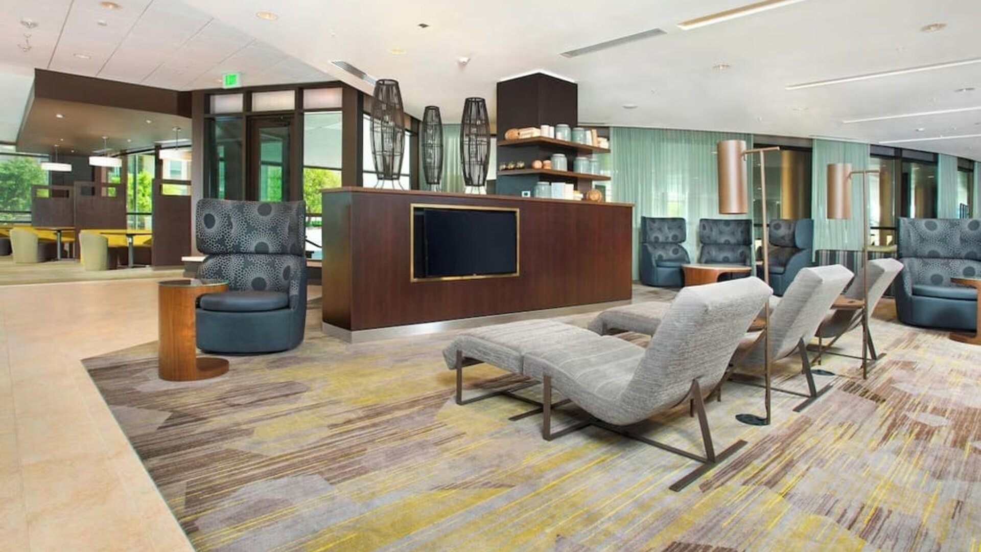 Lobby and coworking lounge at Courtyard By Marriott Redwood City.