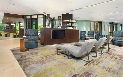 Lobby and coworking lounge at Courtyard By Marriott Redwood City.