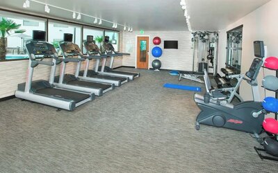 Fitness center available at Courtyard By Marriott Redwood City.