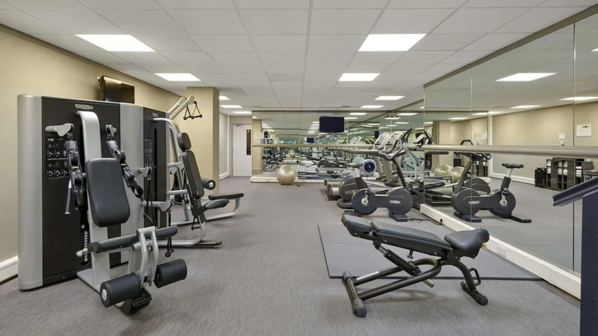 Fully equipped fitness center at Hyatt Place London Heathrow Airport.