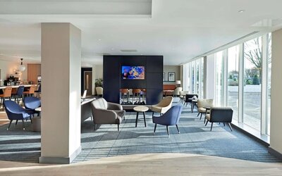 Bright and comfortable lobby lounge at Hyatt Place London Heathrow Airport.