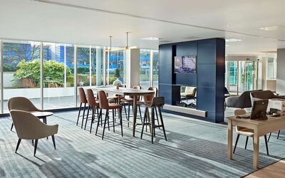 Lobby workspace with computer and printer at Hyatt Place London Heathrow Airport.