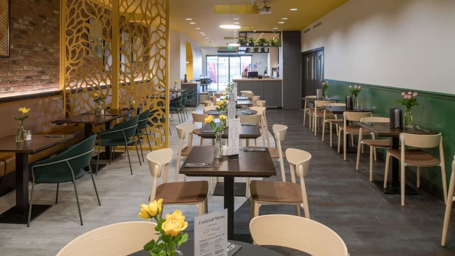 Dining area with comfortable seating perfect for co-working at The Wesley Euston.