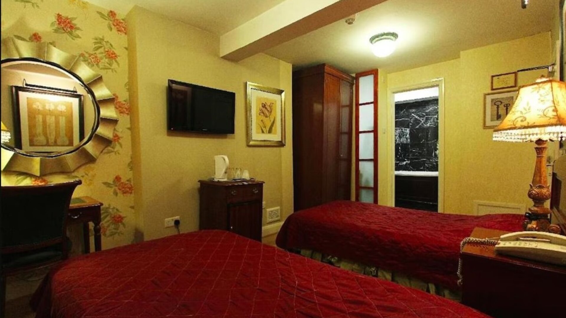 Day use twin room with work desk at Opulence Central London Hotel.