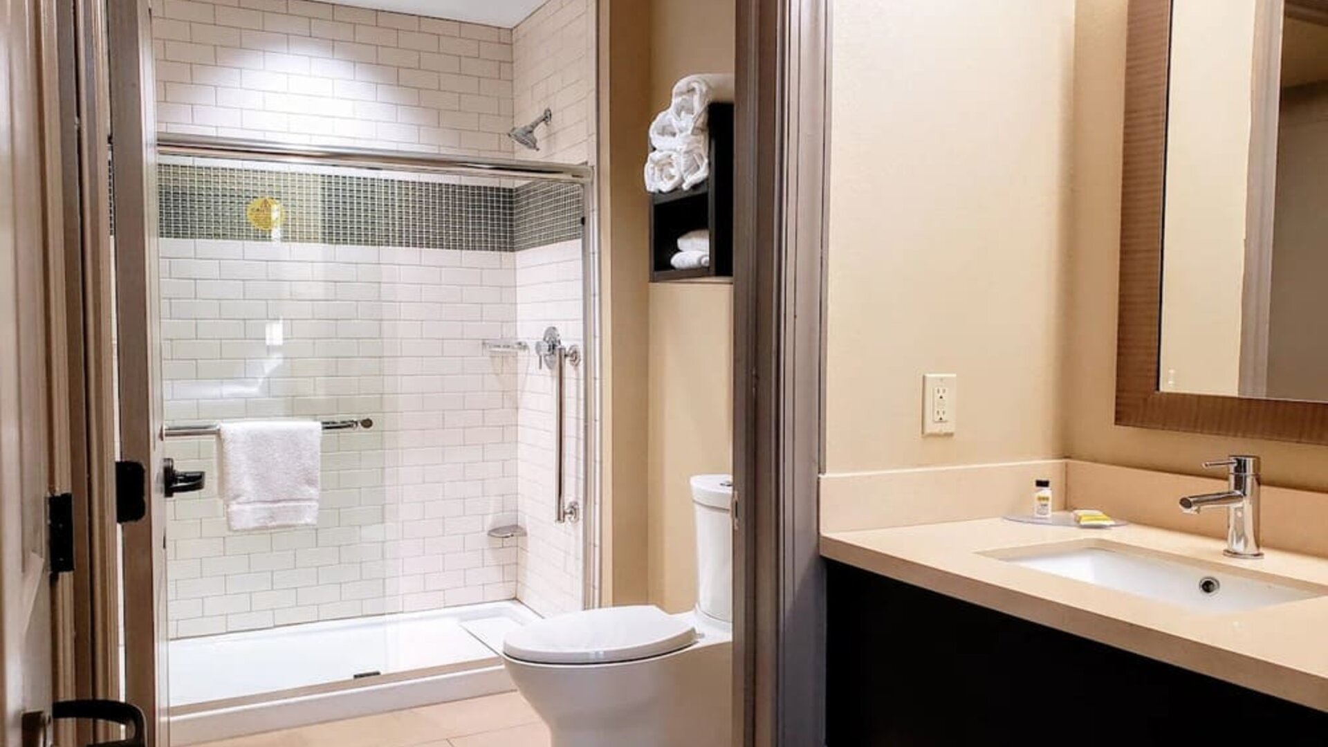 Guest bathroom with shower at Staybridge Suites Baltimore - Inner Harbor.