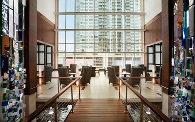 Lobby and coworking lounge at Embassy Suites By Hilton Denver Downtown Convention Center.