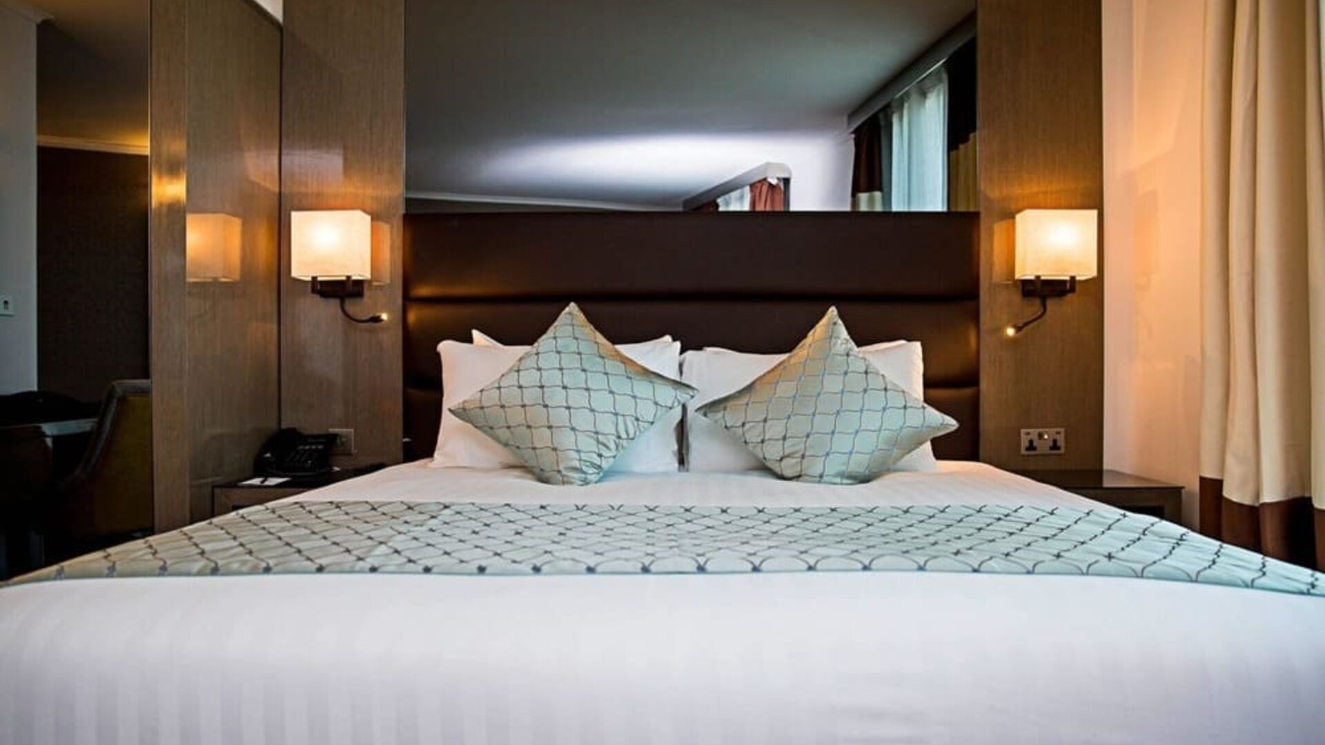 King bed at Atrium Hotel Heathrow.