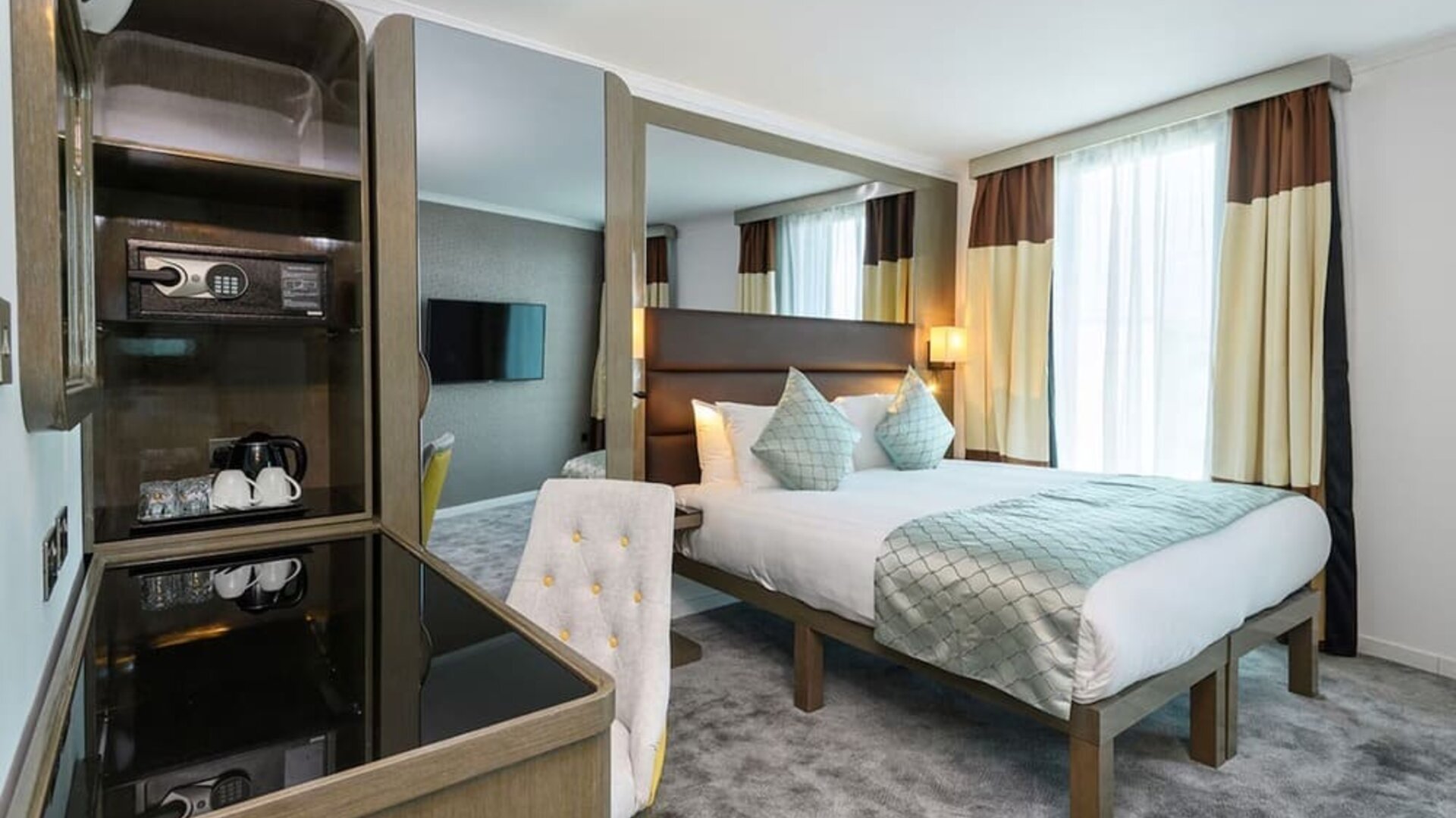 Standard day use room with work desk at Atrium Hotel Heathrow.