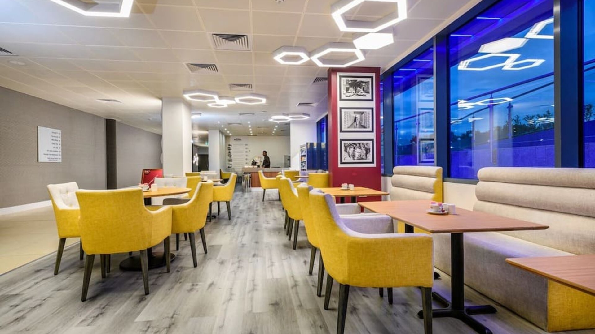 On-site coffee shop with lounge seating, perfect for co-working at Atrium Hotel Heathrow.