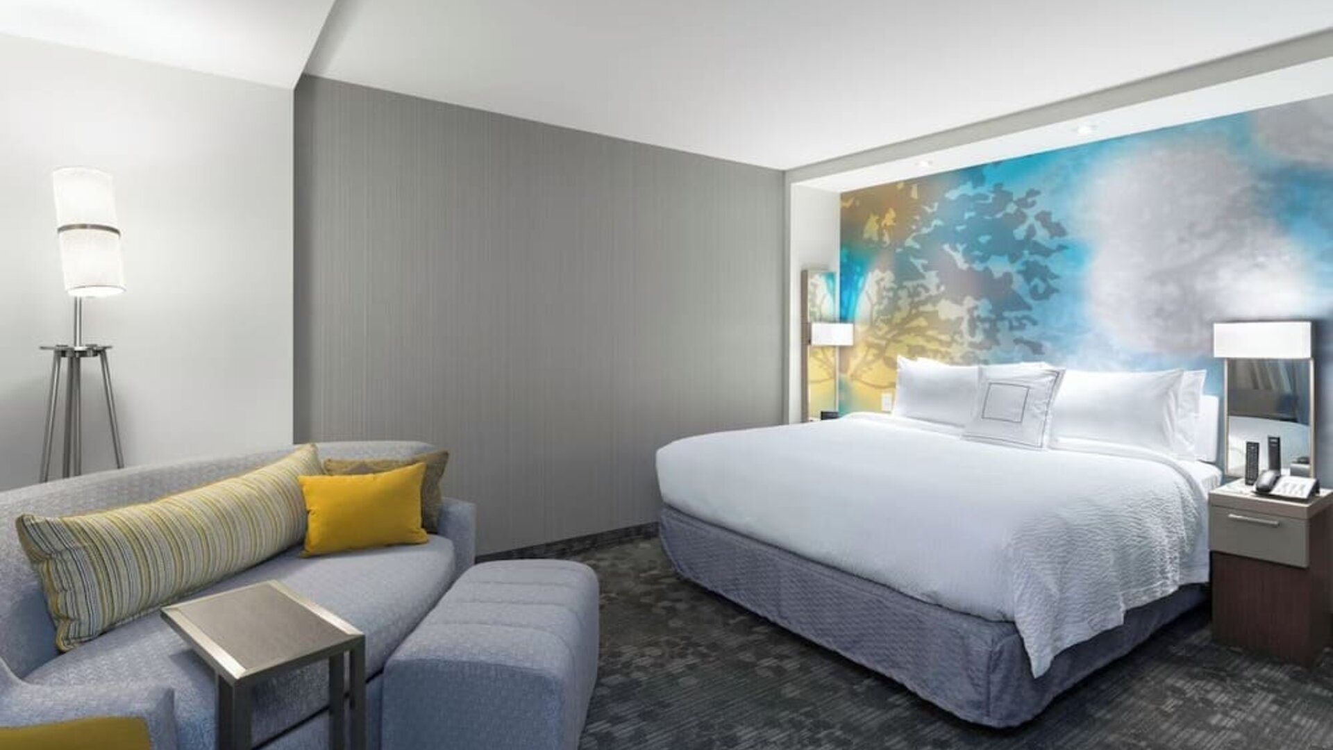 Day use room with sofa at Courtyard By Marriott Ruston.
