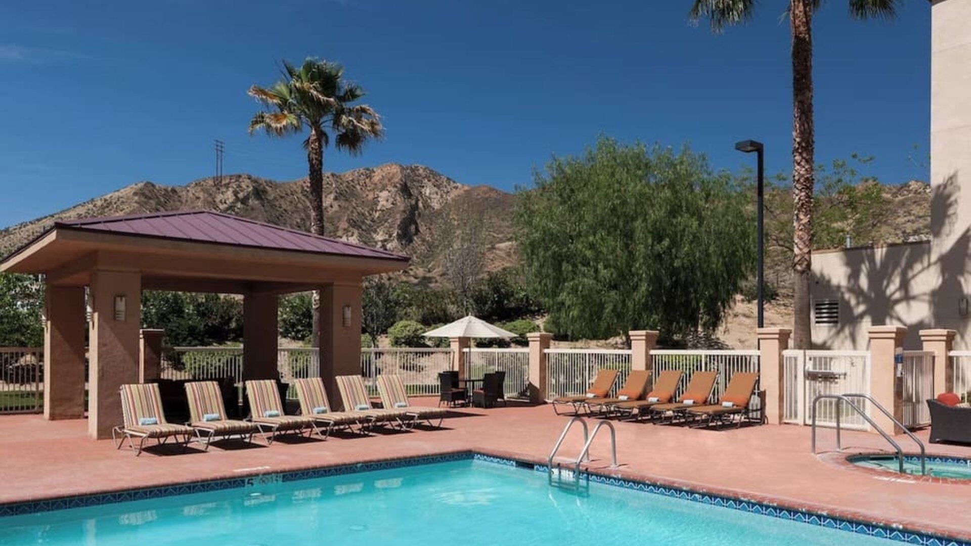 Refreshing outdoor pool at Courtyard By Marriott Santa Clarita Valencia.