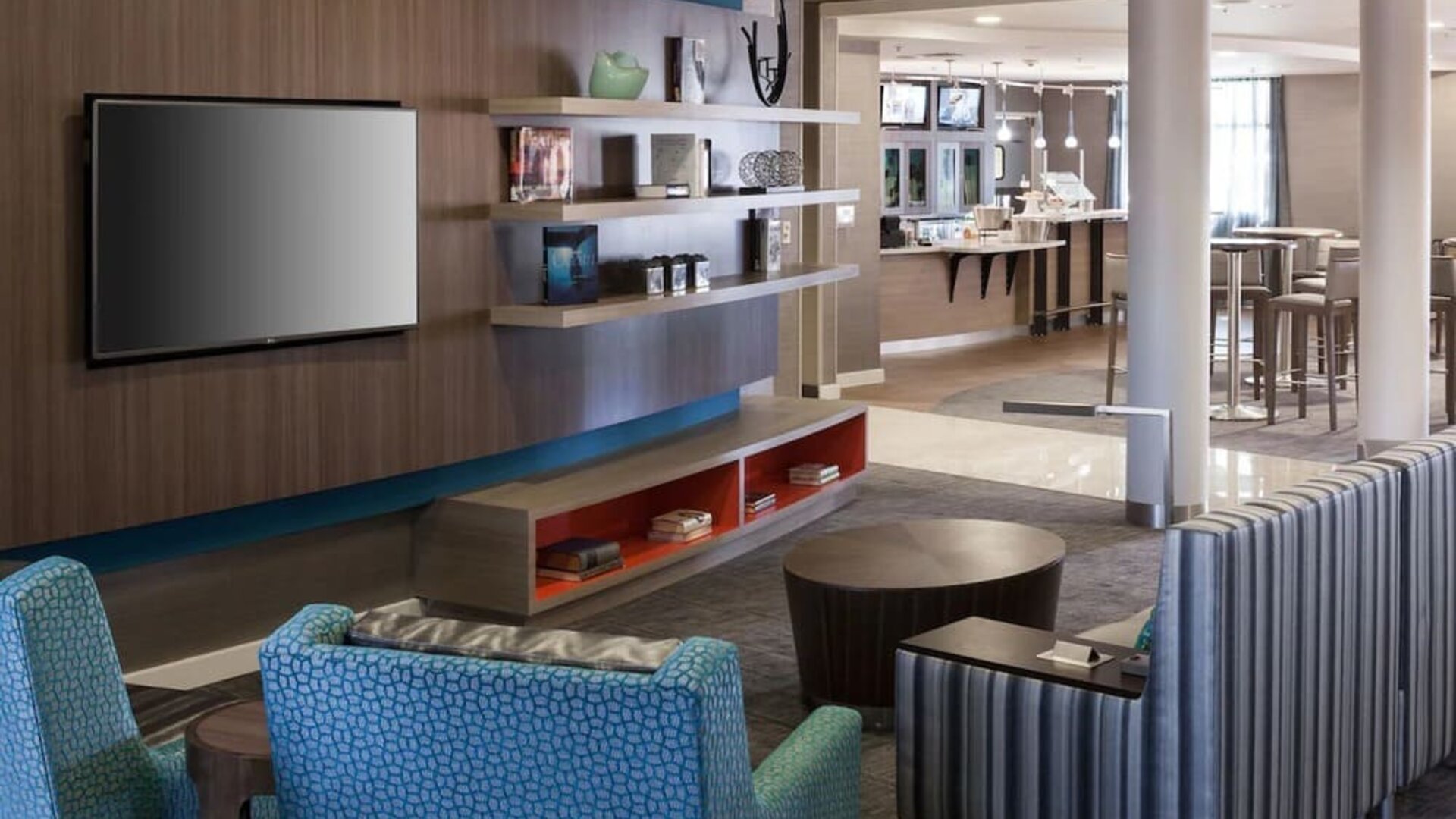 Lobby and coworking lounge at Courtyard By Marriott Santa Clarita Valencia.