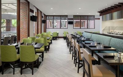Dining area perfect for coworking at DoubleTree Suites By Hilton Hotel Charlotte - SouthPark.