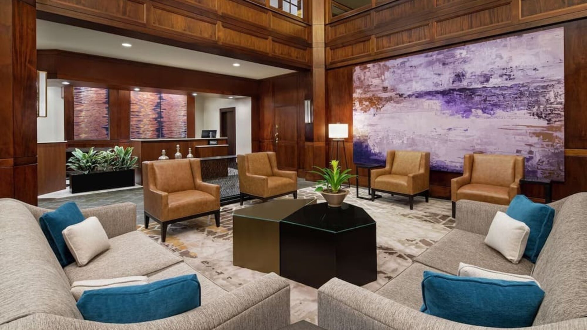 Lobby and coworking lounge at DoubleTree Suites By Hilton Hotel Charlotte - SouthPark.