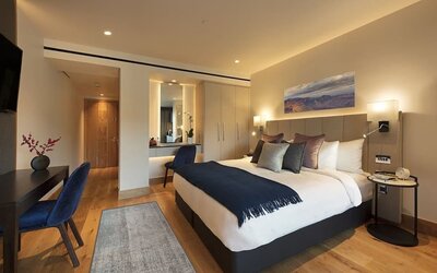 Day use room with work desk and private bathroom at Tower Suites Hotel by Blue Orchid.