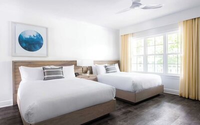 Queen beds at Parrot Key Hotel & Villas.
