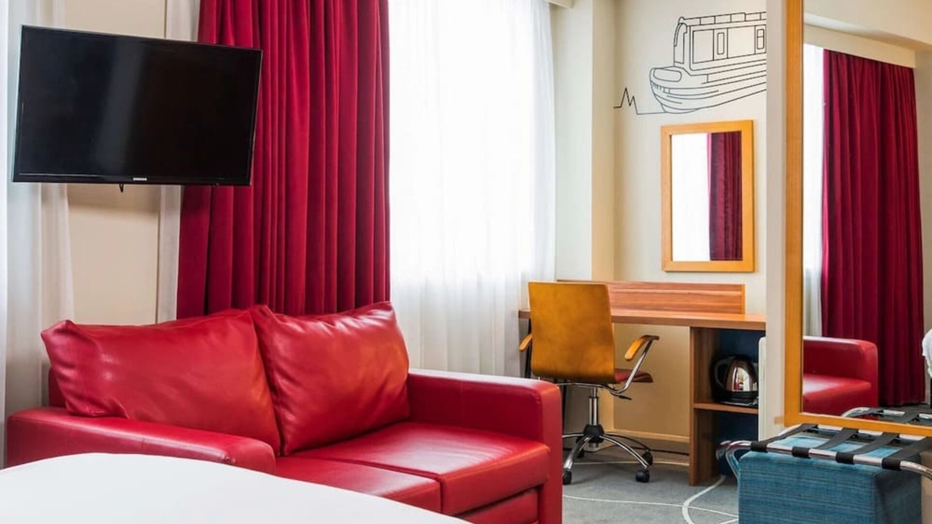 In-room workspace at ibis Styles Birmingham NEC.