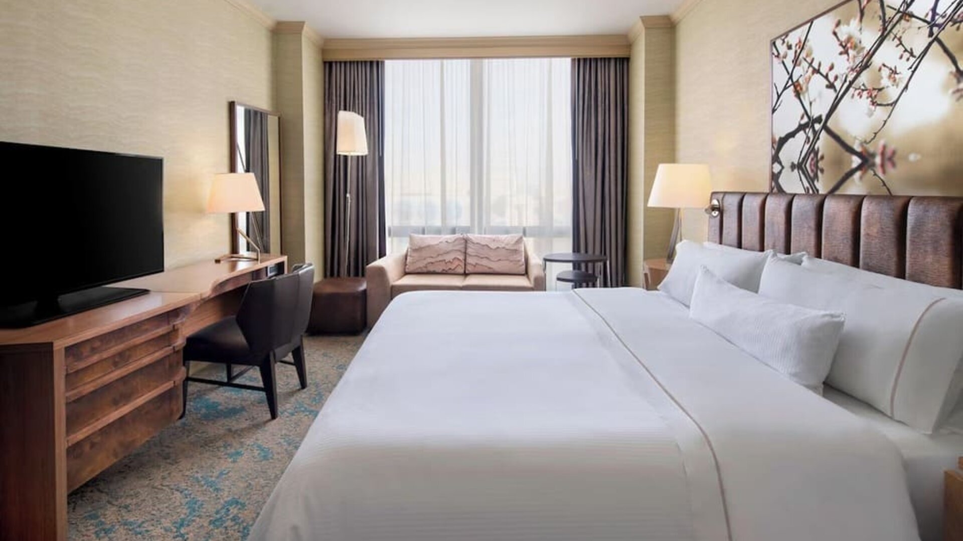 Day use room with sofa and work desk at The Westin Crystal City Reagan National Airport.
