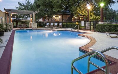 Refreshing outdoor pool at DoubleTree By Hilton Austin University Area.