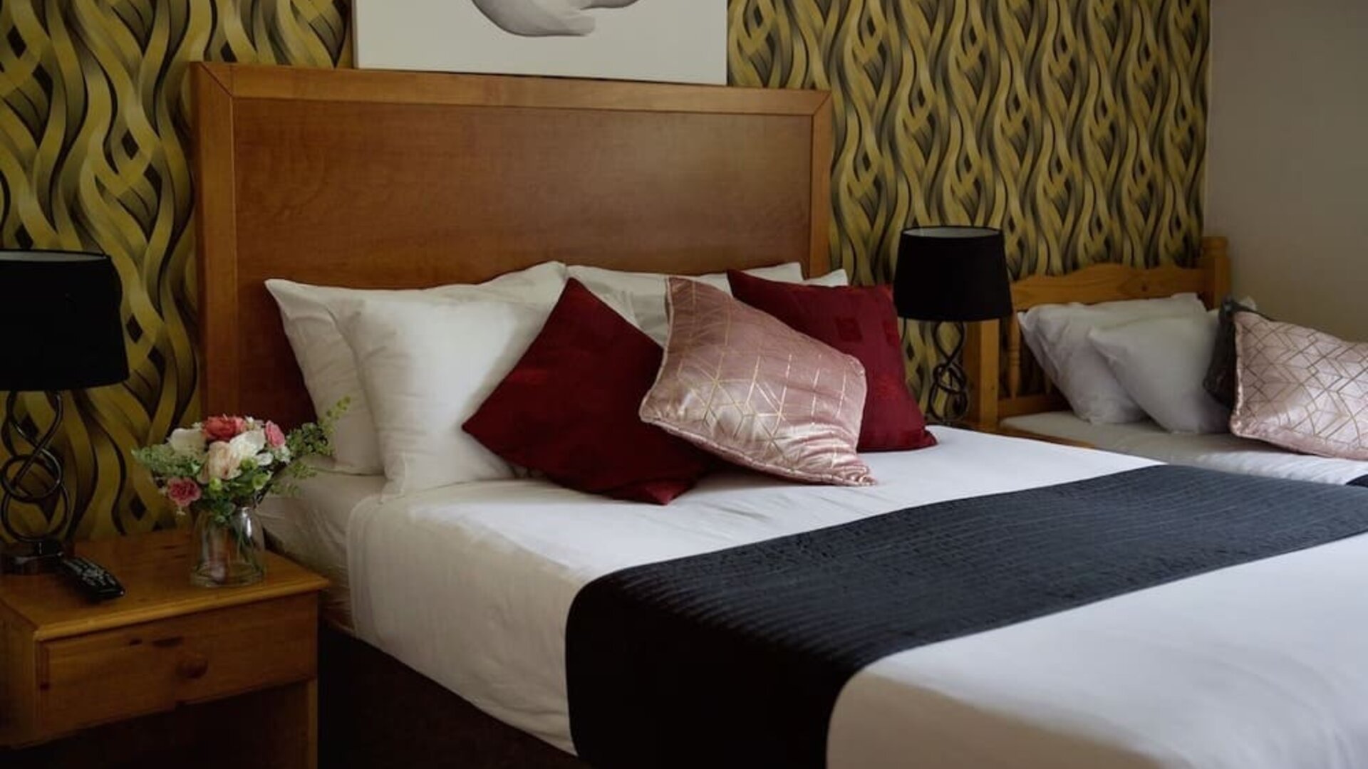 King bed at Little Foxes Hotel.