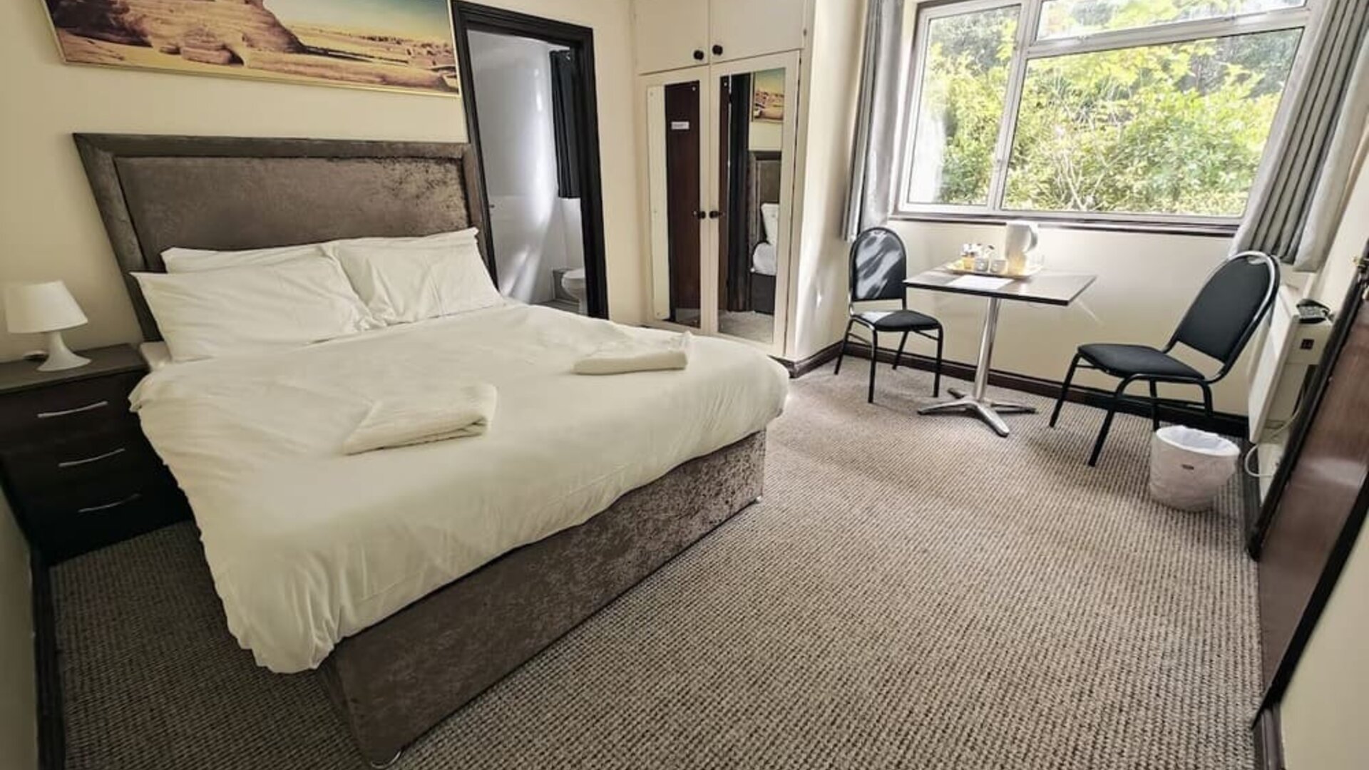 Bright and spacious day use room with lounge area at Little Foxes Hotel.