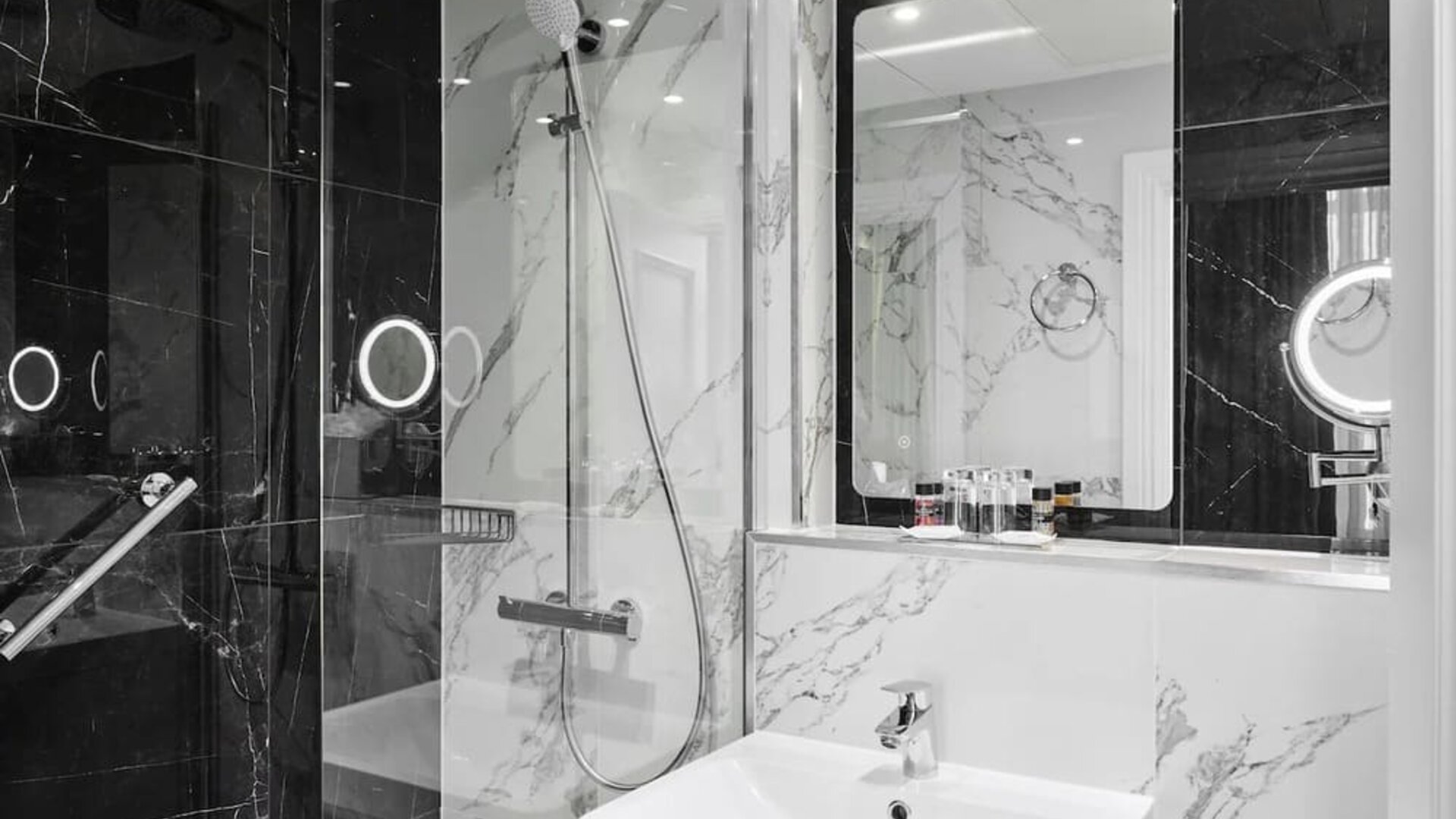 Private guest bathroom with shower at Best Western Plus Dover Marina Hotel & Spa.