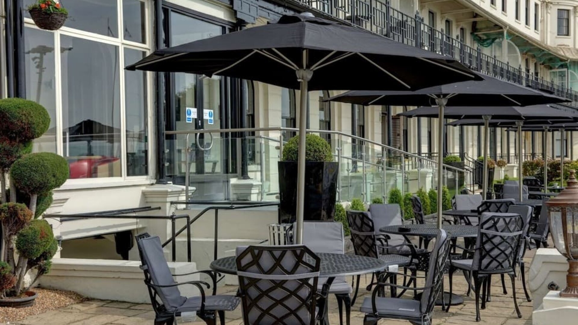 Outdoor seating facing the lake at Best Western Plus Dover Marina Hotel & Spa.