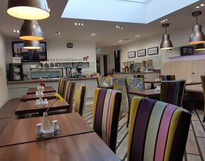 Dining area at Gatwick Belmont Hotel.