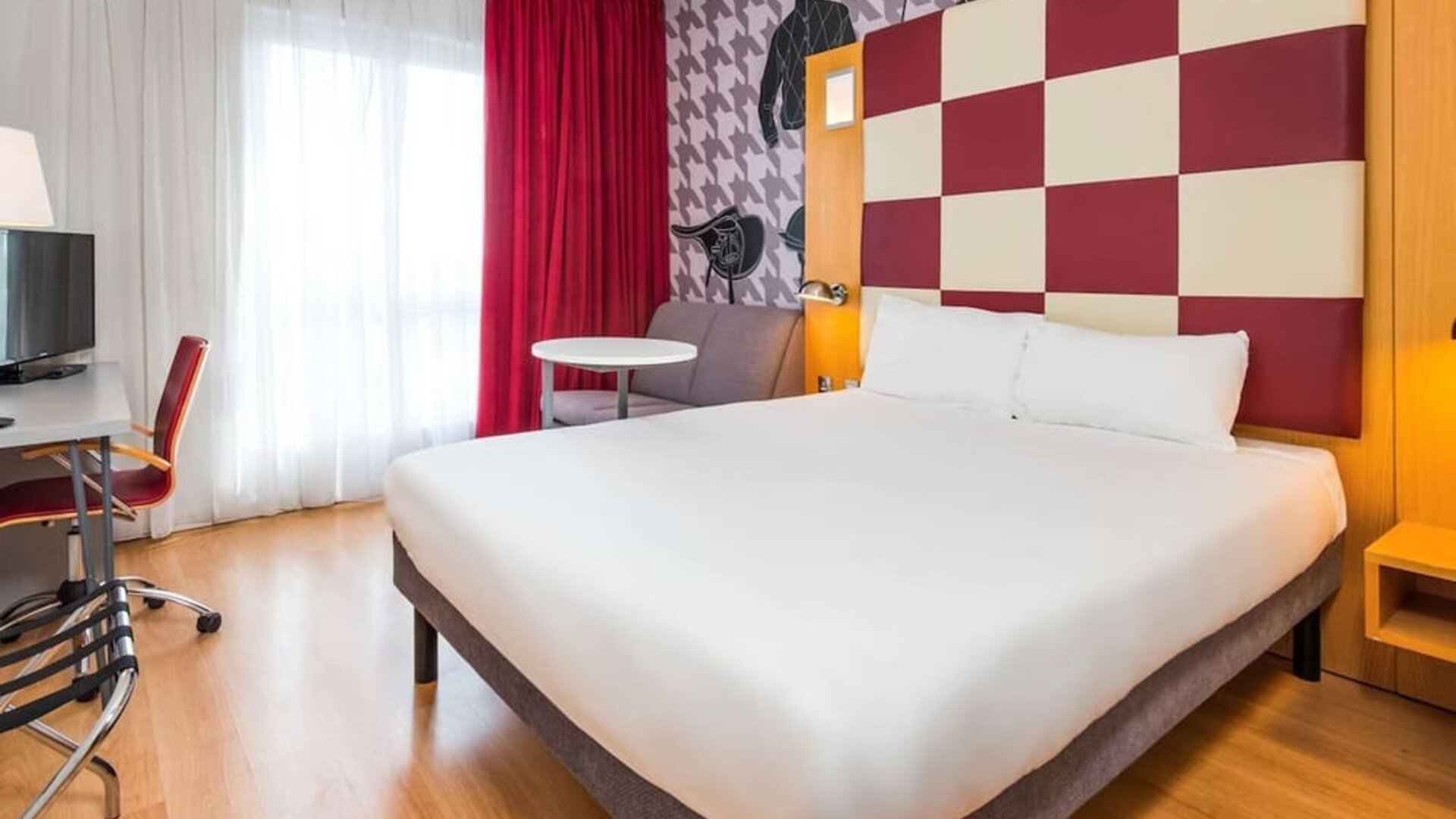 Day use room with work desk and convertible sofa at Ibis Styles Haydock.