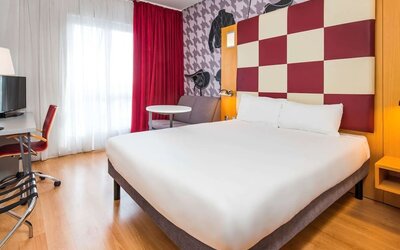 Day use room with work desk and convertible sofa at Ibis Styles Haydock.